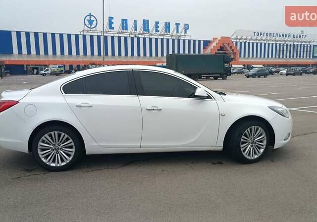 Белый Опель Инсигния, объемом двигателя 1.96 л и пробегом 192 тыс. км за 9500 $, фото 5 на Automoto.ua