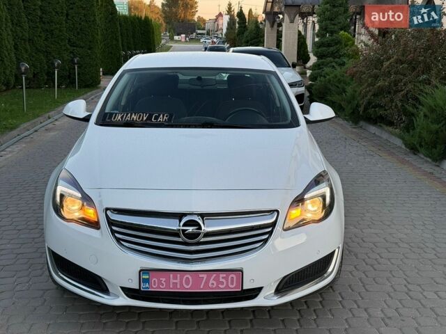 Білий Опель Інсігнія, об'ємом двигуна 2 л та пробігом 183 тис. км за 9899 $, фото 4 на Automoto.ua