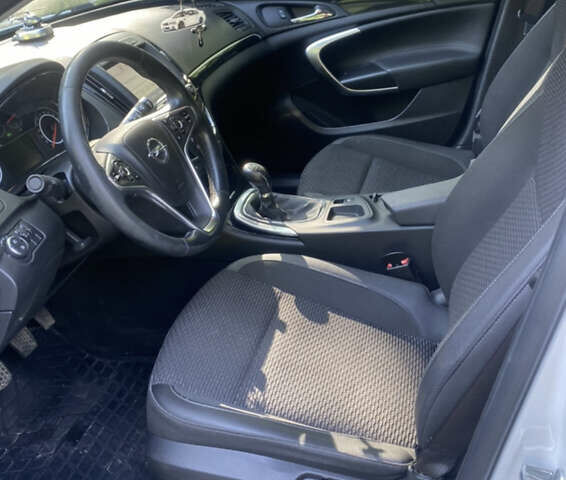 Белый Опель Инсигния, объемом двигателя 1.6 л и пробегом 180 тыс. км за 11200 $, фото 11 на Automoto.ua