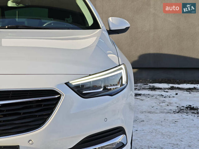 Белый Опель Инсигния, объемом двигателя 2 л и пробегом 182 тыс. км за 17500 $, фото 9 на Automoto.ua