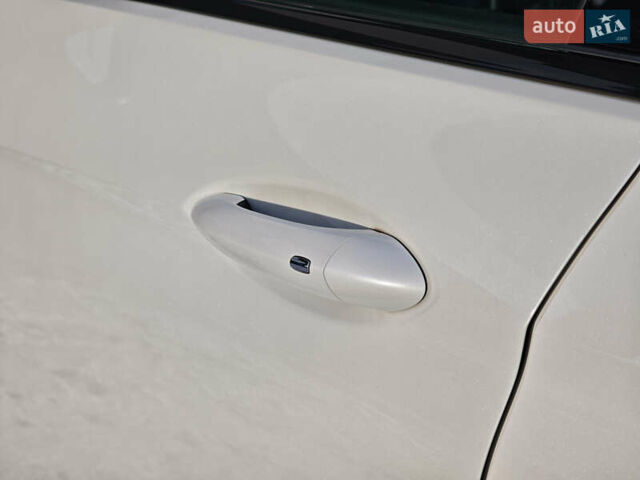 Белый Опель Инсигния, объемом двигателя 2 л и пробегом 182 тыс. км за 17500 $, фото 13 на Automoto.ua