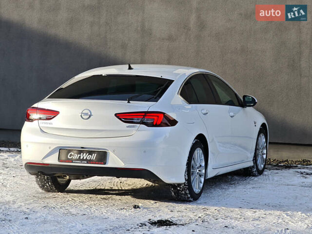 Белый Опель Инсигния, объемом двигателя 2 л и пробегом 182 тыс. км за 17500 $, фото 5 на Automoto.ua