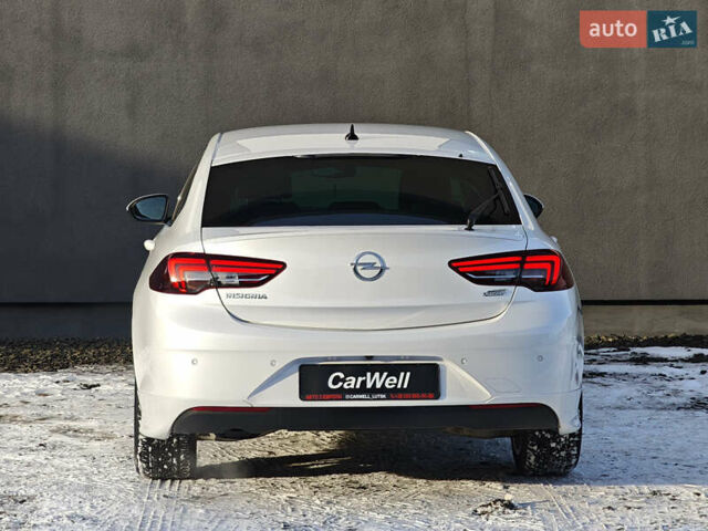Белый Опель Инсигния, объемом двигателя 2 л и пробегом 182 тыс. км за 17500 $, фото 4 на Automoto.ua