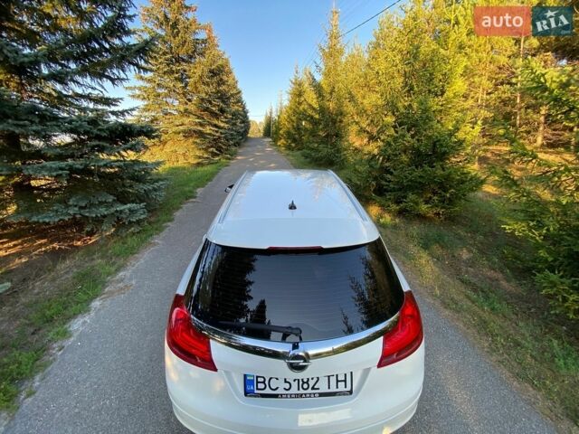 Білий Опель Інсігнія, об'ємом двигуна 2 л та пробігом 264 тис. км за 6600 $, фото 8 на Automoto.ua