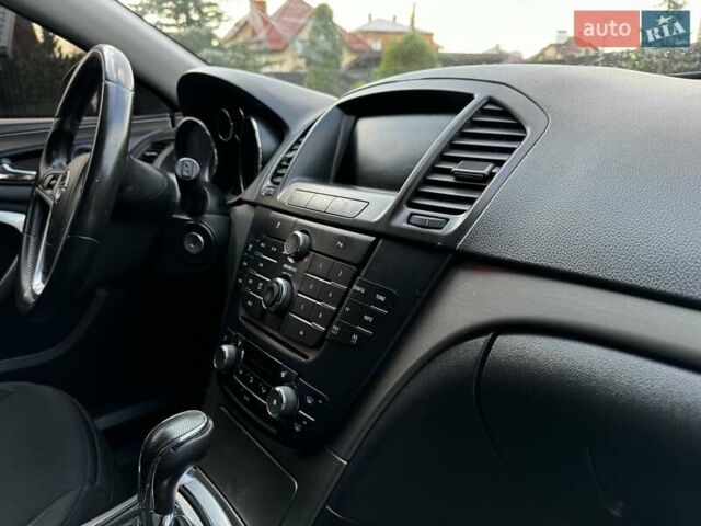 Белый Опель Инсигния, объемом двигателя 2 л и пробегом 245 тыс. км за 7200 $, фото 14 на Automoto.ua