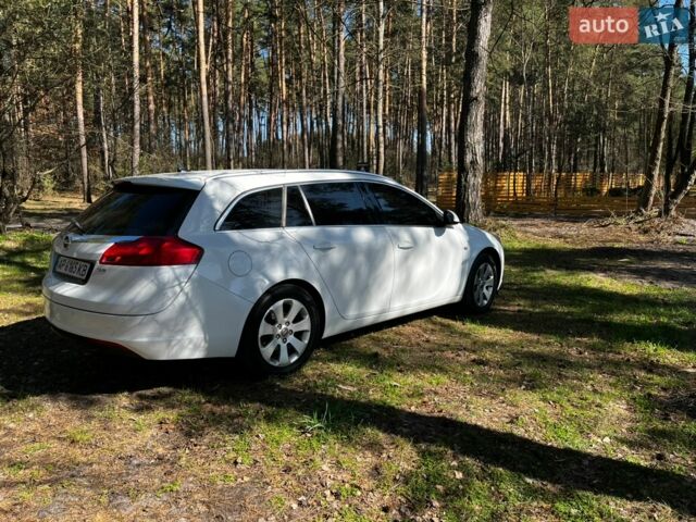 Білий Опель Інсігнія, об'ємом двигуна 1.96 л та пробігом 190 тис. км за 6999 $, фото 5 на Automoto.ua