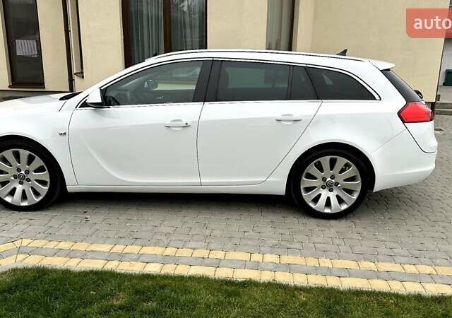 Белый Опель Инсигния, объемом двигателя 1.6 л и пробегом 200 тыс. км за 7770 $, фото 5 на Automoto.ua