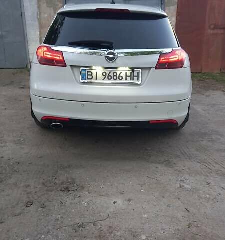 Білий Опель Інсігнія, об'ємом двигуна 1.96 л та пробігом 230 тис. км за 7600 $, фото 6 на Automoto.ua