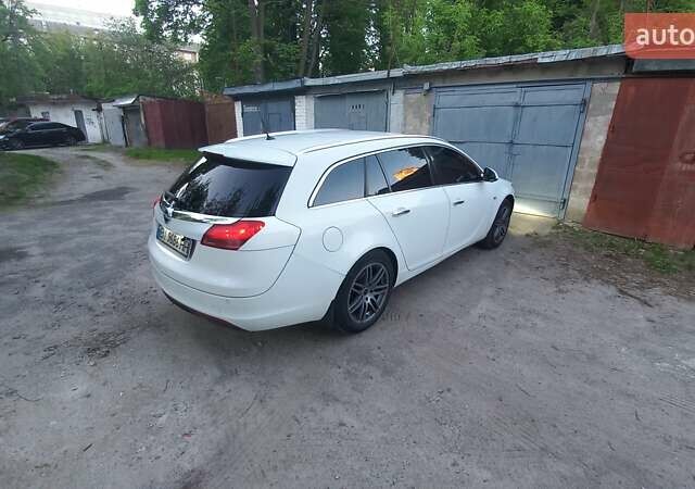 Білий Опель Інсігнія, об'ємом двигуна 1.96 л та пробігом 230 тис. км за 7600 $, фото 8 на Automoto.ua