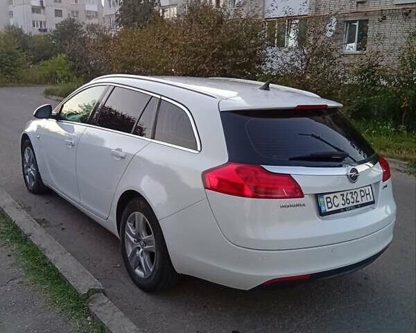 Білий Опель Інсігнія, об'ємом двигуна 1.96 л та пробігом 240 тис. км за 6900 $, фото 8 на Automoto.ua