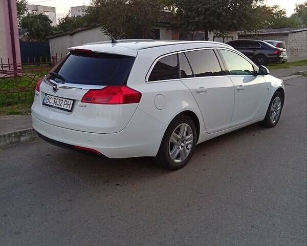 Білий Опель Інсігнія, об'ємом двигуна 1.96 л та пробігом 240 тис. км за 6900 $, фото 3 на Automoto.ua