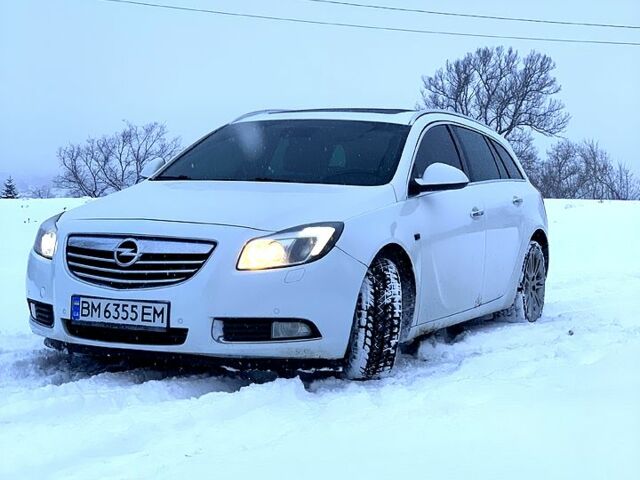 Белый Опель Инсигния, объемом двигателя 2 л и пробегом 23400 тыс. км за 6800 $, фото 1 на Automoto.ua