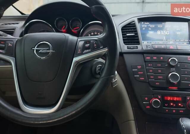 Білий Опель Інсігнія, об'ємом двигуна 1.96 л та пробігом 230 тис. км за 7600 $, фото 18 на Automoto.ua