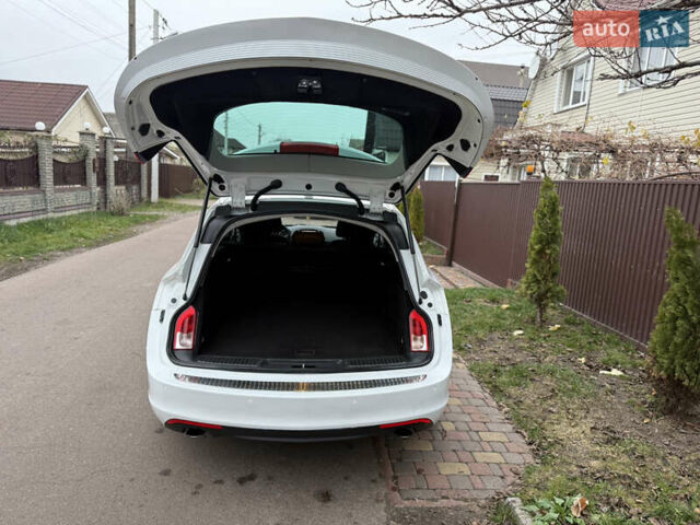 Белый Опель Инсигния, объемом двигателя 1.6 л и пробегом 210 тыс. км за 8300 $, фото 44 на Automoto.ua