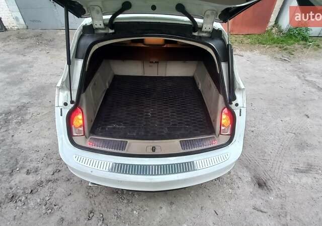 Білий Опель Інсігнія, об'ємом двигуна 1.96 л та пробігом 230 тис. км за 7600 $, фото 23 на Automoto.ua