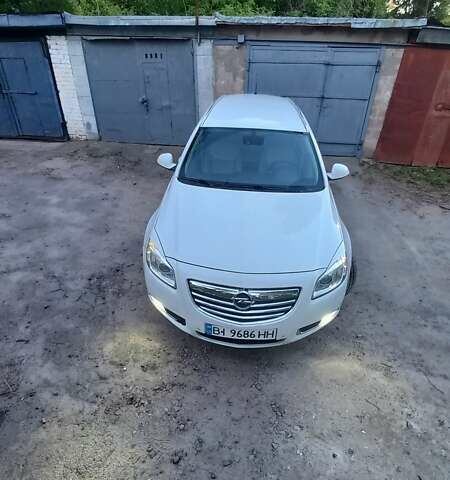 Білий Опель Інсігнія, об'ємом двигуна 1.96 л та пробігом 230 тис. км за 7600 $, фото 5 на Automoto.ua