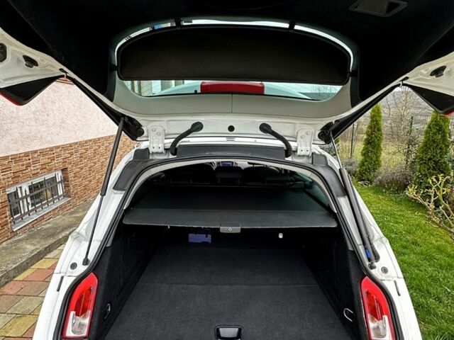 Білий Опель Інсігнія, об'ємом двигуна 2 л та пробігом 167 тис. км за 8500 $, фото 9 на Automoto.ua