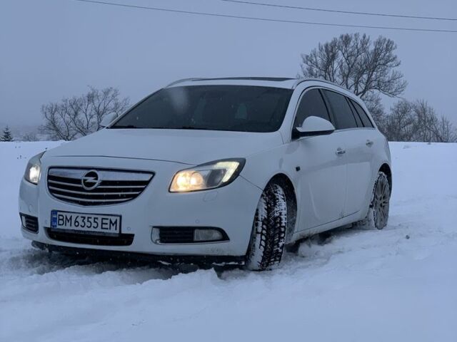 Білий Опель Інсігнія, об'ємом двигуна 2 л та пробігом 300 тис. км за 7500 $, фото 2 на Automoto.ua