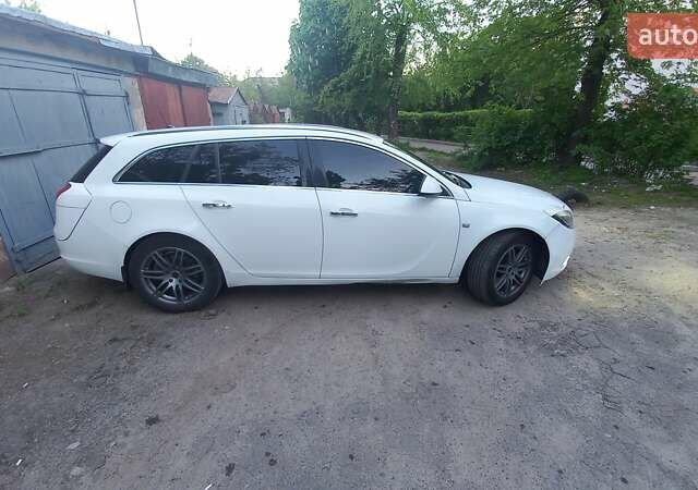 Білий Опель Інсігнія, об'ємом двигуна 1.96 л та пробігом 230 тис. км за 7600 $, фото 3 на Automoto.ua