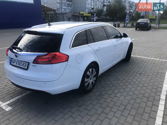 Білий Опель Інсігнія, об'ємом двигуна 1.96 л та пробігом 180 тис. км за 7999 $, фото 4 на Automoto.ua