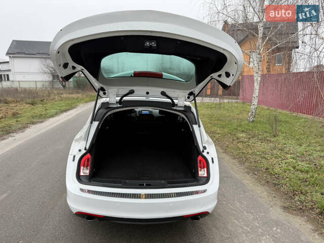 Белый Опель Инсигния, объемом двигателя 1.6 л и пробегом 210 тыс. км за 8000 $, фото 59 на Automoto.ua