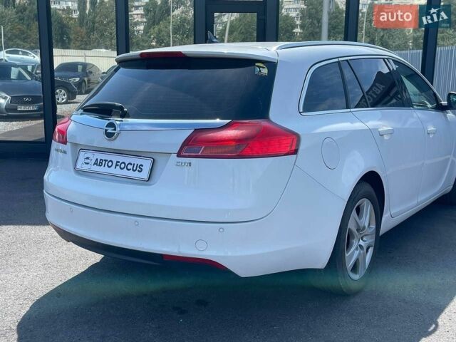 Білий Опель Інсігнія, об'ємом двигуна 1.96 л та пробігом 319 тис. км за 5990 $, фото 5 на Automoto.ua