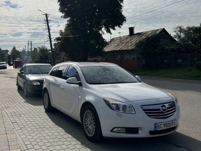 Білий Опель Інсігнія, об'ємом двигуна 2 л та пробігом 400 тис. км за 7100 $, фото 6 на Automoto.ua