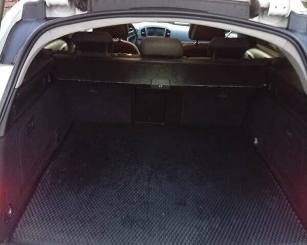 Білий Опель Інсігнія, об'ємом двигуна 1.96 л та пробігом 240 тис. км за 6900 $, фото 2 на Automoto.ua