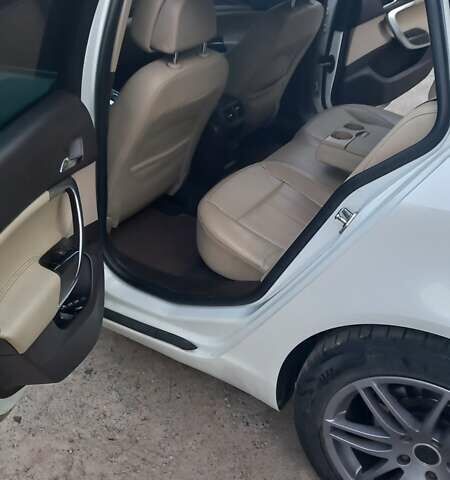 Білий Опель Інсігнія, об'ємом двигуна 1.96 л та пробігом 230 тис. км за 7600 $, фото 15 на Automoto.ua