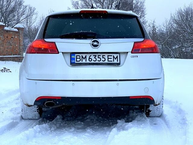 Белый Опель Инсигния, объемом двигателя 2 л и пробегом 23400 тыс. км за 6800 $, фото 4 на Automoto.ua