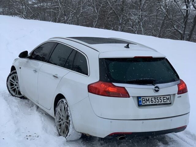 Білий Опель Інсігнія, об'ємом двигуна 2 л та пробігом 300 тис. км за 7500 $, фото 6 на Automoto.ua