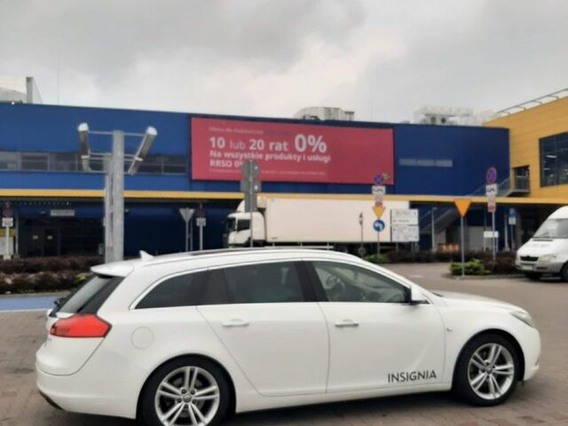 Белый Опель Инсигния, объемом двигателя 2 л и пробегом 289 тыс. км за 8000 $, фото 3 на Automoto.ua