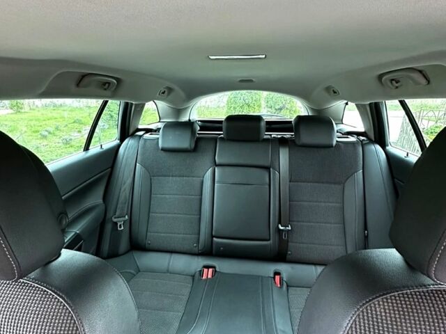 Білий Опель Інсігнія, об'ємом двигуна 2 л та пробігом 167 тис. км за 8500 $, фото 8 на Automoto.ua