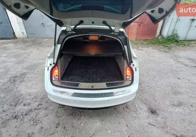 Білий Опель Інсігнія, об'ємом двигуна 1.96 л та пробігом 230 тис. км за 7600 $, фото 22 на Automoto.ua