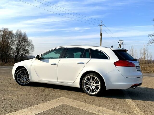 Білий Опель Інсігнія, об'ємом двигуна 2 л та пробігом 222 тис. км за 8100 $, фото 2 на Automoto.ua