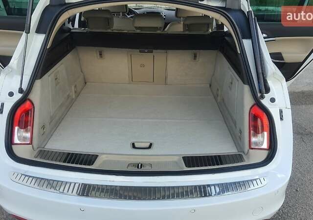 Белый Опель Инсигния, объемом двигателя 2 л и пробегом 223 тыс. км за 8700 $, фото 6 на Automoto.ua