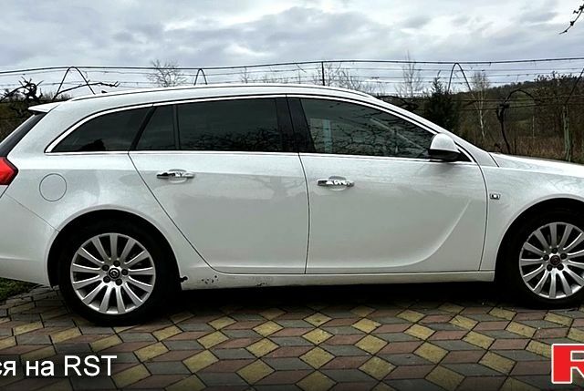 Білий Опель Інсігнія, об'ємом двигуна 2 л та пробігом 167 тис. км за 8500 $, фото 3 на Automoto.ua