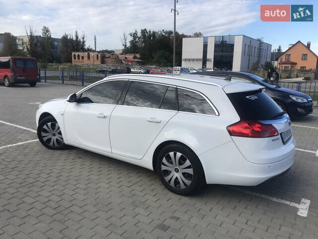 Білий Опель Інсігнія, об'ємом двигуна 1.96 л та пробігом 180 тис. км за 7999 $, фото 6 на Automoto.ua