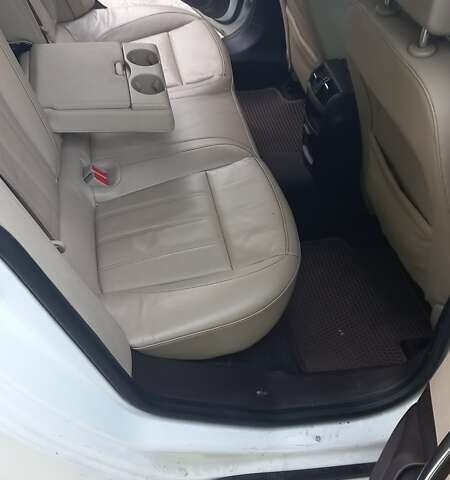 Білий Опель Інсігнія, об'ємом двигуна 1.96 л та пробігом 230 тис. км за 7600 $, фото 19 на Automoto.ua