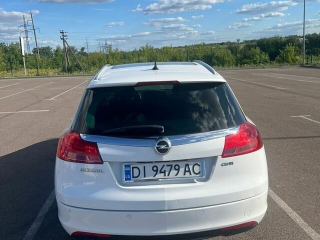 Белый Опель Инсигния, объемом двигателя 2 л и пробегом 324 тыс. км за 7499 $, фото 7 на Automoto.ua