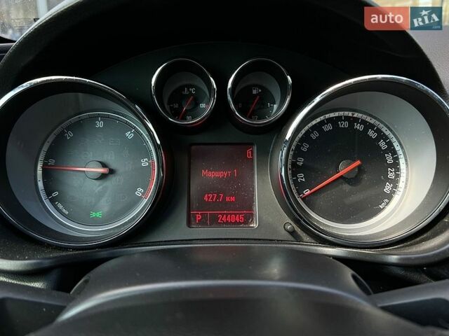 Білий Опель Інсігнія, об'ємом двигуна 1.96 л та пробігом 244 тис. км за 7800 $, фото 13 на Automoto.ua