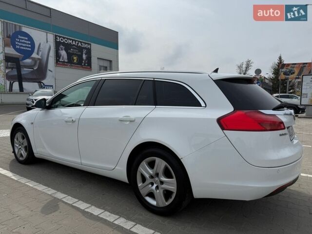 Белый Опель Инсигния, объемом двигателя 1.96 л и пробегом 318 тыс. км за 6999 $, фото 5 на Automoto.ua