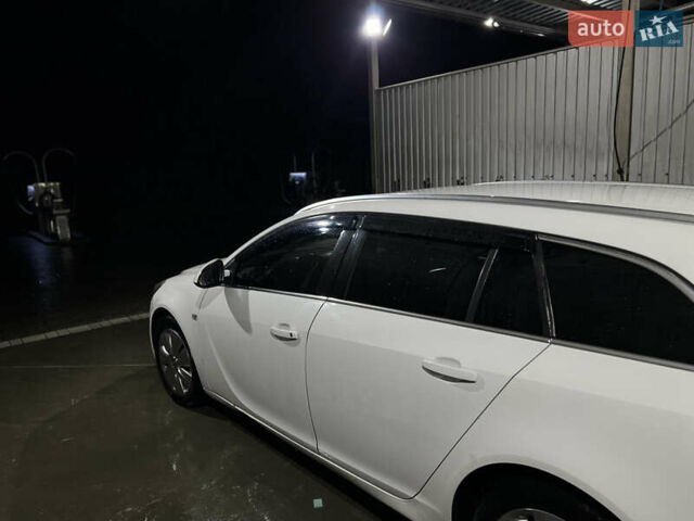 Белый Опель Инсигния, объемом двигателя 1.96 л и пробегом 295 тыс. км за 6450 $, фото 6 на Automoto.ua