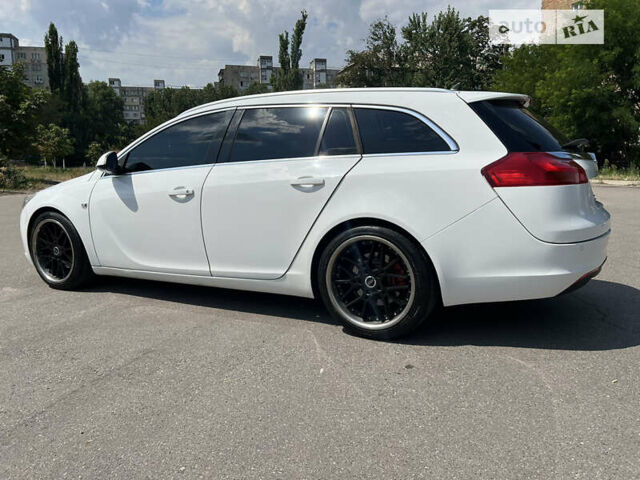 Білий Опель Інсігнія, об'ємом двигуна 1.96 л та пробігом 235 тис. км за 8700 $, фото 19 на Automoto.ua