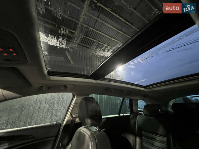 Білий Опель Інсігнія, об'ємом двигуна 2 л та пробігом 263 тис. км за 7700 $, фото 12 на Automoto.ua