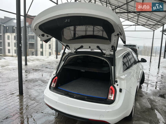 Белый Опель Инсигния, объемом двигателя 1.96 л и пробегом 235 тыс. км за 6450 $, фото 15 на Automoto.ua