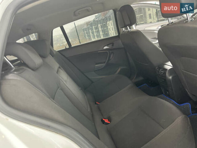 Белый Опель Инсигния, объемом двигателя 1.96 л и пробегом 235 тыс. км за 6450 $, фото 14 на Automoto.ua