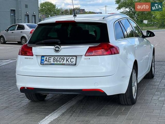 Білий Опель Інсігнія, об'ємом двигуна 2 л та пробігом 290 тис. км за 7900 $, фото 8 на Automoto.ua