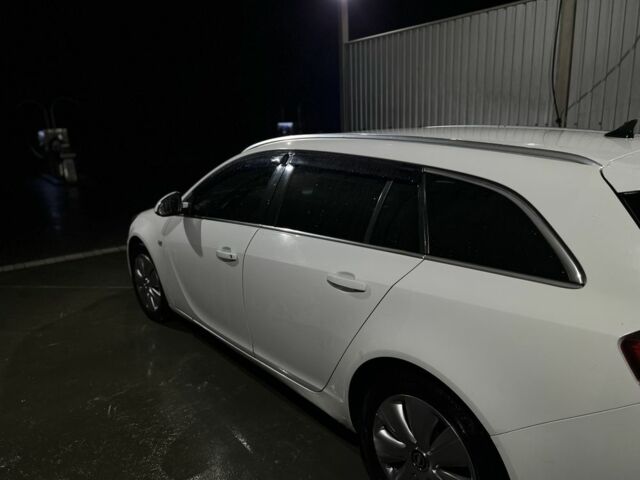 Белый Опель Инсигния, объемом двигателя 2 л и пробегом 325 тыс. км за 6599 $, фото 6 на Automoto.ua