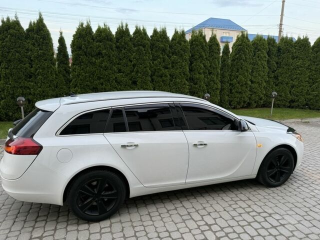 Белый Опель Инсигния, объемом двигателя 2 л и пробегом 294 тыс. км за 6499 $, фото 6 на Automoto.ua